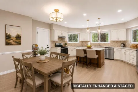 Kitchen and breakfast area, digitally enhanced and staged (digitally enhanced and staged)