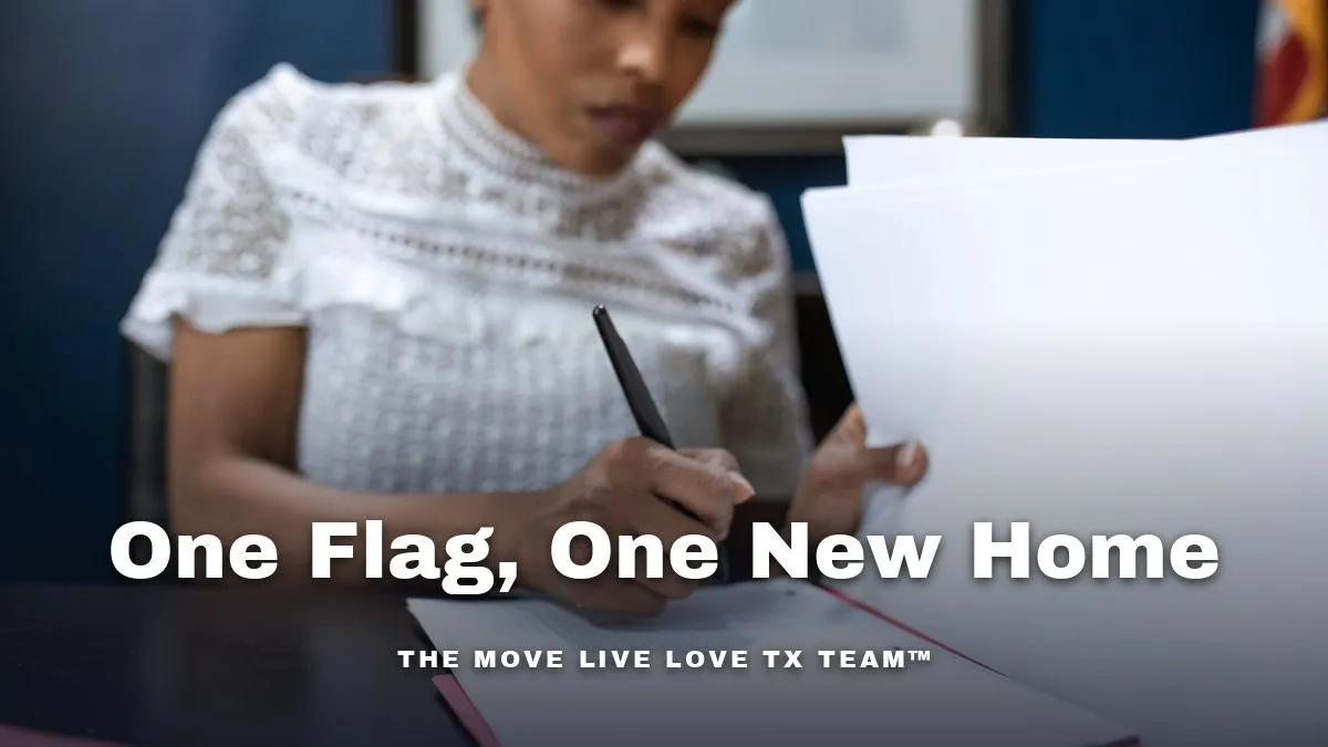 A woman reviewing mortgage paperwork at a kitchen table with a folded American flag nearby in soft daylight